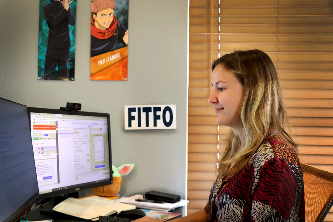 Mikaela at her desk in the Round Rock office